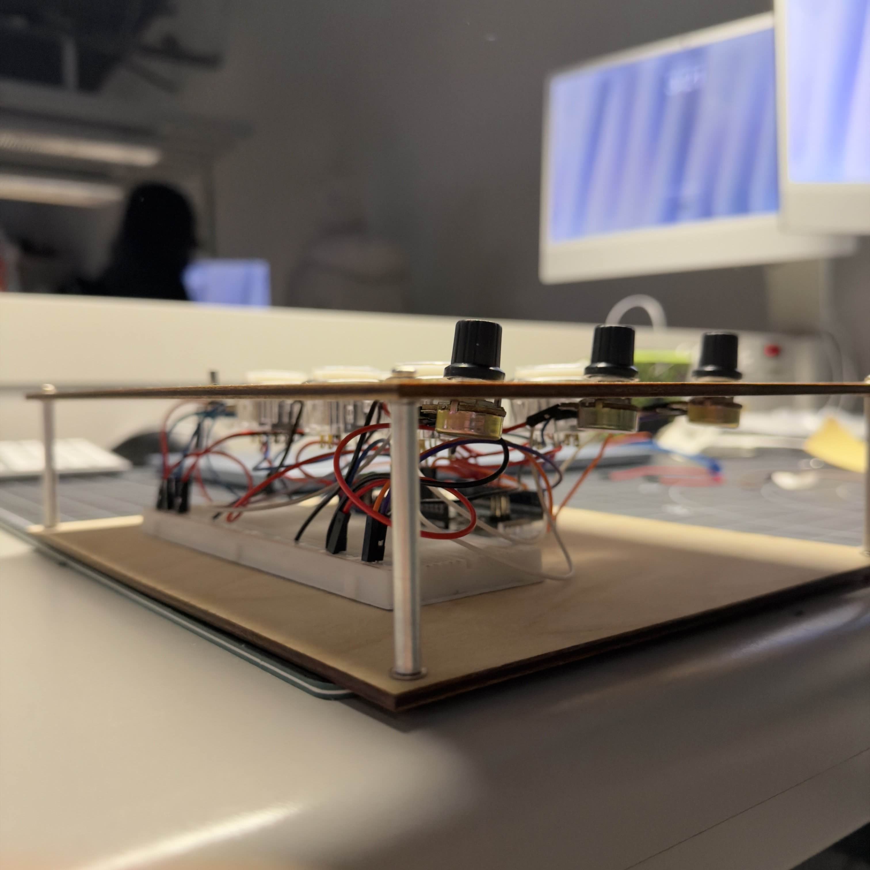 Side profile view showing metal spacers and the internal electronics. This step finalizes the casing and secures the board for reliable, long term use.